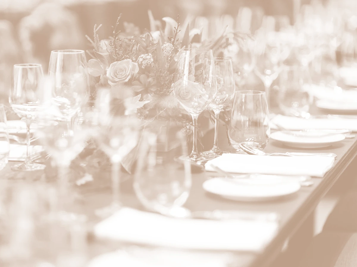Tabletop with glasses, silverware and plates